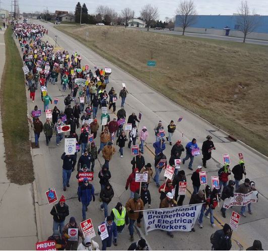 67_march on 26th st with ibew banner.JPG